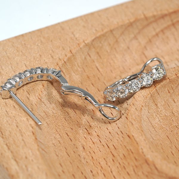 18K white gold diamond earrings, worn view