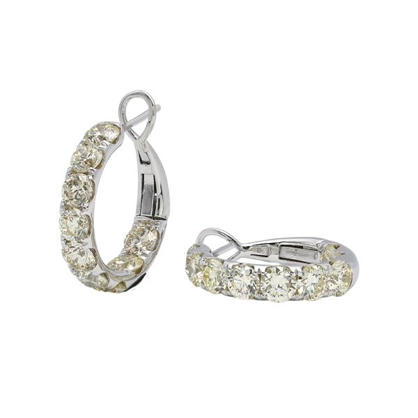 18K white gold diamond earrings, angle view 18K white gold diamond earrings, angle view