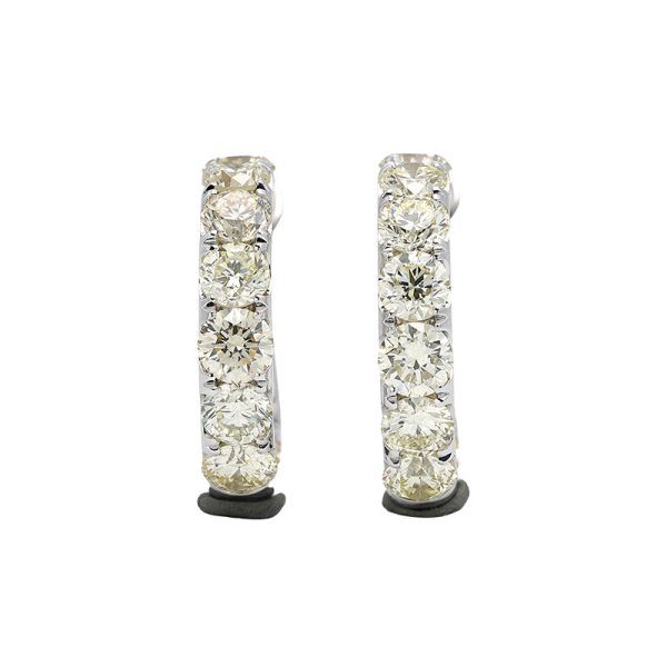 18K white gold diamond earrings, lifestyle view 18K white gold diamond earrings, lifestyle view