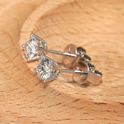 18K white gold diamond earrings, worn view