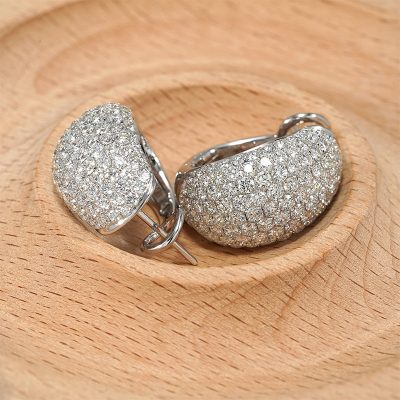 18K white gold diamond earrings, worn view