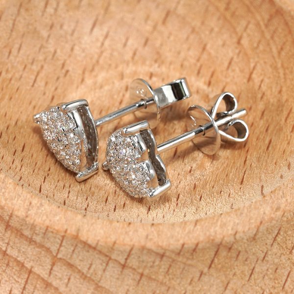 18K white gold diamond earrings, worn view