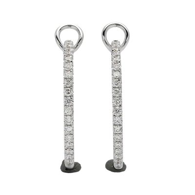 18K white gold diamond earrings, lifestyle view 18K white gold diamond earrings, lifestyle view