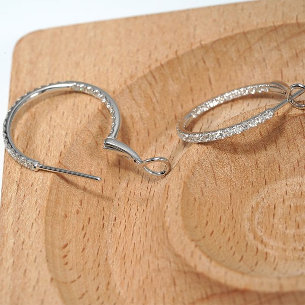 18K white gold diamond earrings, worn view 18K white gold diamond earrings, worn view