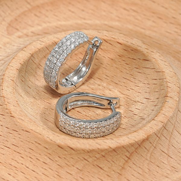 18K white gold diamond earrings, worn view