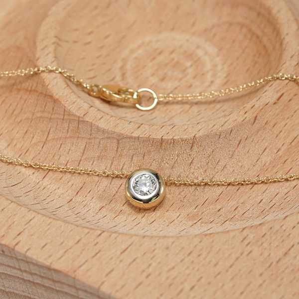 18K yellow gold diamond pendant, angle view 18K yellow gold diamond pendant, angle view